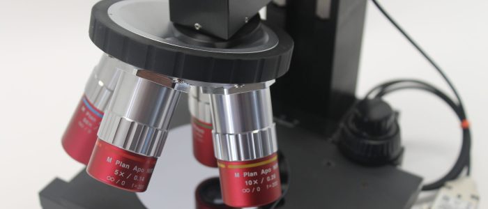 Close-up of microscope objective lenses Close-up of microscope objective lenses